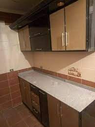 مطبخ uv اسود ف بيج غامق مع بالتقسيط مطابخ كلادينج و يوڤي facebook