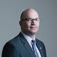 Dr. Kristopher Wells