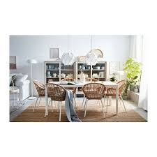 Nilsove Chair With Armrests Rattan White Ikea In 2021 Rattan Dining Chairs Ikea Chair Dining Chairs