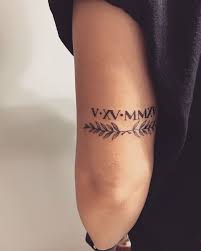 100+ roman numeral tattoos that will mark your most memorable date. Roman Numerals W Olive Branches Above Elbow Tattoo Roman Numeral Tattoo Arm Subtle Tattoos