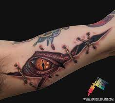 Smaug Eye By Me Marc Durrant At Md Tattoo Studio In Northridge Ca Imgur Ripped Skin Tattoo Skin Tear Tattoo Flame Tattoos