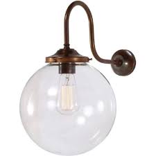 Clear glass shades maximize brightness while frosted shades offer a softer look. Down Facing Swan Neck Antique Wall Light With Clear Glass Globe Shade