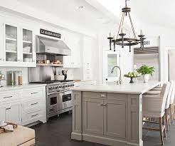 There are so many different styles of gray to choose from, such as pewter, charcoal, greige (a the backsplash tile, set in a stacked design, relates. White Kitchen With Gray Or Greige Island Love The Stainless Steel Appliances Too Island Kitchen Design Decor Neutral Kitchen Designs Kitchen Design