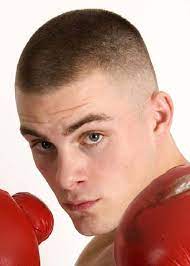 Hair gets shorter toward the crown. This High Fade Haircut Fades From Zero Length On The Sides And Back To A Number Two Blade On Top On Ha Military Haircuts Men Military Haircut Haircuts For Men