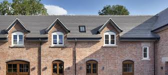 The staffordshire mixture, dark heather and staffordshire blue colours have a fine sanded finish, whilst the smooth blue is a smooth finished tile. Rustic Staffordshire Blue Clay Roof Tiles