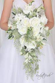 Premium holiday decor & voted #1 in realism trees as seen on tv. White Cascading Davids Bridal Wedding Flowers Greenery Bouquet Bride Brides White Roses Bridal Wedding Flowers Cascading Wedding Bouquets Bride Bouquets White