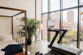 In addition to floor protection a thick, rubber mat does well with vibration absorption and noise cancellation. Is Working Out At Home The Latest Fitness Fad Peloton Room Ideas Treadmill In Living Room Room Ideas Bedroom