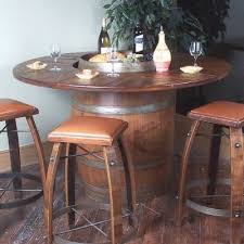 Stools have a wrought iron frame attached to reclaimed barrel stave legs and leather covered seat. 135 Wine Barrel Furniture Ideas You Can Diy Or Buy Photos
