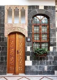 دار دمشقي front doors with windows courtyard house house doors