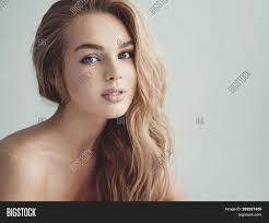 Cool seasons (summer or winter) do not depend on contrast or lack of contrast between skin/hair/and eye color, rather it is the overall undertone of these three things. Young Blond Woman Long Image Photo Free Trial Bigstock