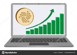 Iota Coin With Growth Chart On A Laptop Screen Stock