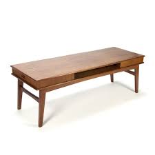 The pedestal stand not only makes it appear to float above the floor, but also makes it easy to get close to the table when you're sitting on the couch or the floor. Danish Teak Vintage Coffee Table With Drawers Retro Studio