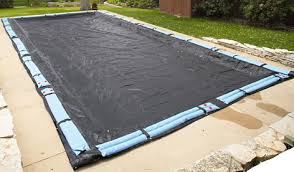 Pool covers on indoor pools not only can reduce evaporation but also the need to ventilate indoor air and replace it with unconditioned outdoor air. Traditional Winter Cover Vs Safety Solid Spring Cover For In Ground Pools Prestige Pools And Spas