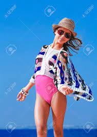Cute Young Girl Model Posing On The Beach. Фотография, картинки,  изображения и сток-фотография без роялти. Image 94528373