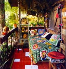 This outdoor sanctuary features simple furnishings with colorful fabrics, terracotta planters, and an abundance of cacti and ferns for an outdoor oasis. 39 Awesome Bohemian Porch Decor Ideas Digsdigs