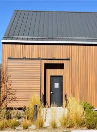 Composite Wood Cladding Versus Fiber Cement Siding Take A Look Cladding Cedar Cladding Composite Cladding