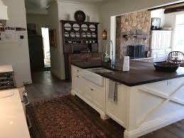 A New Farmhouse Kitchen In Sherwin Williams Dover White Tuscan Kitchen Farmhouse Kitchen Colors White Kitchen Cabinets