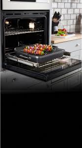 If oven is hot, door latch will release automatically when oven. Wall Ovens Kitchenaid