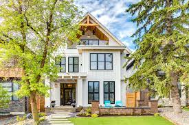 This design is unique because the house has no windows frames. Modern Farmhouse In Altadore Farmhouse Exterior Calgary By Trickle Creek Designer Homes Houzz