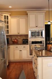 Our cabinets are white (dynasty omega in pearl). Kitchen Cabinets Home Kitchens Yellow Kitchen Walls Kitchen Remodel