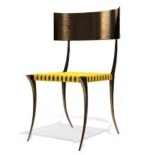 This sculptural design is expertly made with chamfered sabre legs and a curved back. Chair Brass Klismos Max