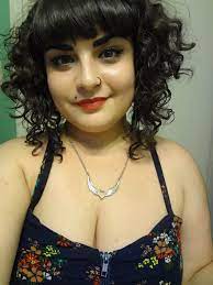 Attractive black girl with lush curly hair posing for a fashion magazine photoshoot. Fat Girls Short Hair Yes
