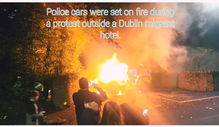 Stones and fireworks were thrown at officers stationed outside a hotel used to house asylum seekers in Dublin.