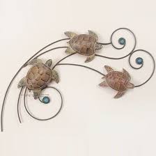 Due to the handcrafted nature of this product, minor variations highland dunes this adorable pair of little sea equines will delight as part of your sea theme home décor. Sea Turtle Wave Wall Sculpture Small With Images Sea Turtle Wall Art Turtle Wall Art Wall Sculptures