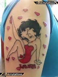 Los tatuajes de pinups caricaturas o de dibujos animados ofrecen un lado más suave de la mística del diseño de modelo de la muchacha. Imagens Betty Boop Tattoos Cute Girl Tattoos Cute Tattoos