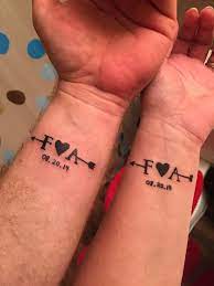 Husband And Wife Tattoos Me And My Husband Got This For Our 1 Year Anniversary Wife Tattoo Husband Tattoo Husband Wife Tattoos
