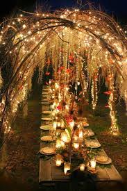 Twinkling Fairy Lights And Sweeping Branches For Outdoor Dining With Style Outdoor Dining Fairy Lights Outdoor Fall Wedding Outdoor Wedding Wedding Lights