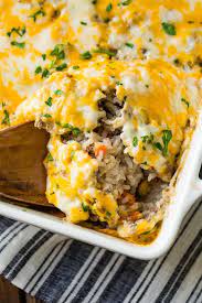 Cheesy Ground Beef And Rice Casserole Oh Sweet Basil Recipe Recipes Ground Beef Casserole Beef And Rice