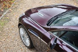 Image result for Amethyst Red 2012 Aston Martin
