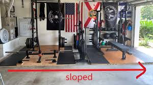 Pull up bars are an excellent way to get a full body workout at home without taking up too much space. How To Deal With A Sloped Garage Gym Floor Two Rep Cave