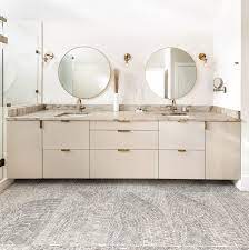 We just had a terrible water leak and had to rip out our shower. Calm And Clean Bathroom Using A Neutral Color Scheme Bathroom Cleaning Double Vanity Sophisticated Bathroom