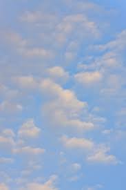 White clouds and blue sky during daytime. Glossy White Clouds And Blue Sky With Golden Light Stock Photo Picture And Royalty Free Image Image 14531697