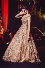 Beautiful Gold Cocktail Gown With Off Shoulder Detailing And Plunge Neck Wedmegood Wedmegood Indianwedd Indian Wedding Gowns Reception Gown Cocktail Gowns