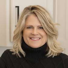 Sally Luehman , Broker Owner