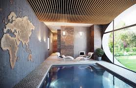 Indoor Pool Mit Kreativer Wandgestaltung Und Einen Schonen Blick Zum Garten Kleiner Innenpool Luxusschwimmbader Schwimmbad Designs