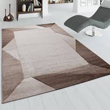 Maschinengefertigter kunstfellteppich mit vernähtem saum. Wohnzimmer Teppich Mit Bordure Und 3 D Effekt Kurzflor Teppich In Beige Braun Kaufen Bei Diva Teppich Center