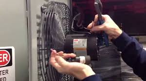 A start capacitor holds an extra charge to start a motor moving. Dayton Fan Motor Start Run Capacitor Replacement Youtube