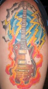 Guitar tattoo design music tattoo designs music tattoos body art tattoos i tattoo tatoos dad tattoos music tattoo les paul and what seems to be an orange cab/amp. Gibson Tattoos New Photos Added