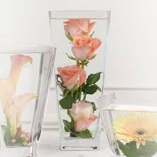 And she had a long white veil dependent from her hair, and she had bridal flowers in her hair, but her hair i saw that the dress had been put upon the rounded figure of a young woman, and that the figure upon. Centerpieces That Give Putting Flowers In Water A New Meaning Blooms By The Box
