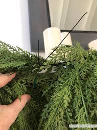Hanging a garland above your fireplace mantle and stockings gives your home a warm and festive look during the holidays, but damaging your home with nails leaves a terrible view for the rest of the year. How To Attach Garland To A Fireplace Mantel And Other Fun Updates The Sunny Side Up Blog
