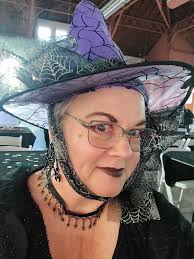 Hat and spider web print ribbon are from Dollar Tree.