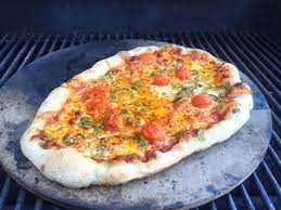 Pizza Grilling On A Pizza Stone Pizza Stone Recipes Grilled Pizza Cooking Stone