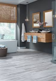 Vinyl plank flooring is one of the most popular flooring choices for busy households, offices, cafes and this makes it the ideal flooring solution for spaces such as basements, kitchens, bathrooms i am considering installing vinyl plank wood look flooring in my home. You Can T Help But Relax When Surrounded By Our Cape May Design Shown In White Cap Comb Vinyl Flooring Bathroom Luxury Vinyl Tile Luxury Vinyl Tile Flooring