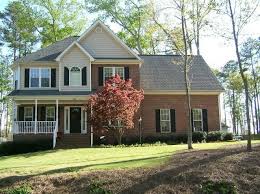 Black And White House With Red Brick Cream Siding With Red Brick Brick Exterior House Red Brick House Exterior Red Brick House