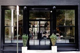 all black store front shop interiors shop front design shop window design