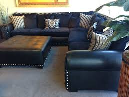 Mix colour and print, leather and fabric and don't be afraid of going bold with patterns. Navy Leather Sofa Living Room Ideas Novocom Top